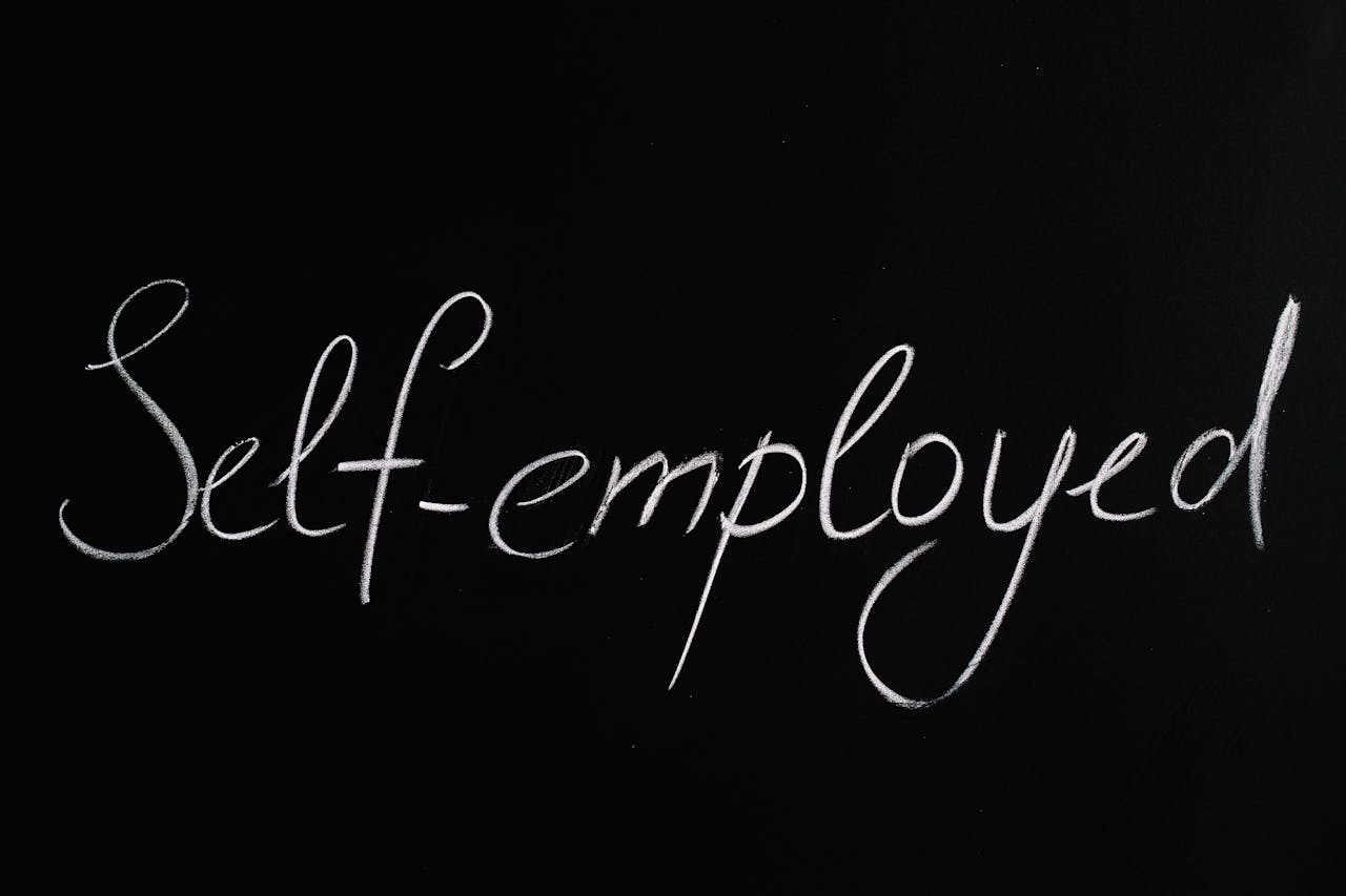 Self-Employed Lettering Text on Black Background